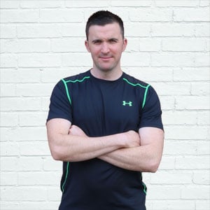 image of david marshall, personal trainer, with arms folded across his chest